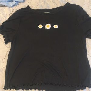 black top with floral detail!